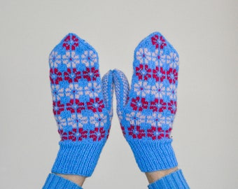 Light blue mittens, hand knitted mittens with stylized flover pattern. Wool mittens