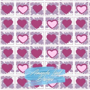 May include: A repeating pattern of pink hearts in a grid, some outlined in pink, others solid. The hearts are set against a light purple background within white squares. The text "Amanda Lind Designs" is in the lower right corner.