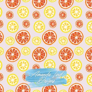 May include: A repeating pattern of orange and yellow citrus fruit slices on a light purple background. The design includes large and small orange slices and lemon slices. The text "Amanda Lind Designs" is visible in the lower portion of the image.