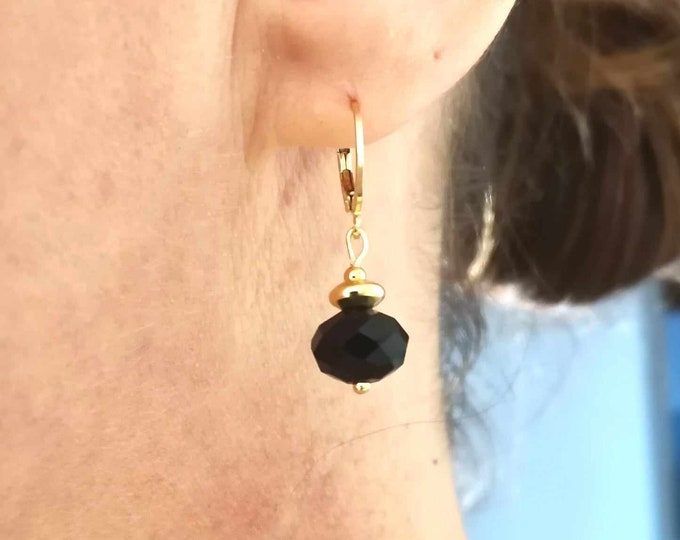 Pearl, gold and black earrings