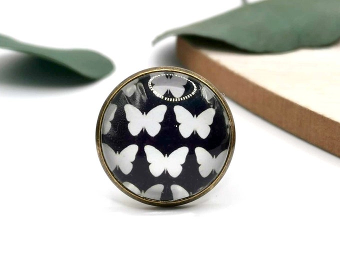 Black and white cabochon ring, butterflies, adjustable bronze ring