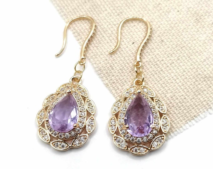 Earrings, gold and zircons, mauve