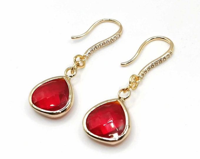 Gold earrings, red glass and zircons