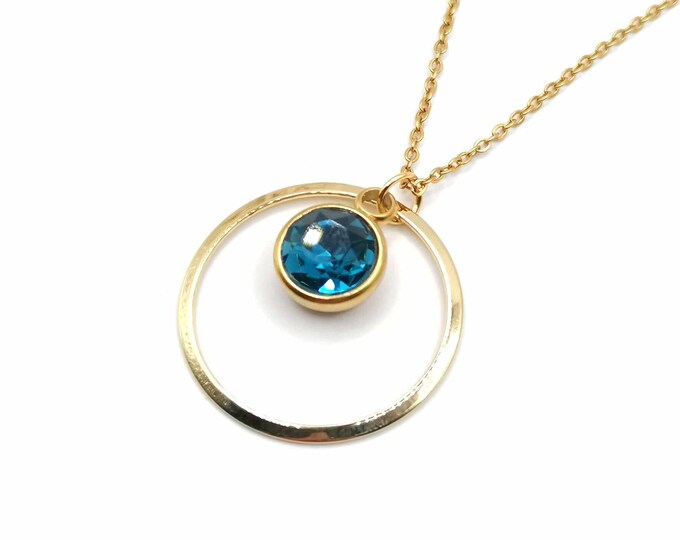 Stainless steel, gold, and blue glass stone necklace