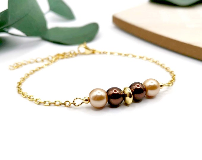 Thin stainless steel, gold and pearl bracelet