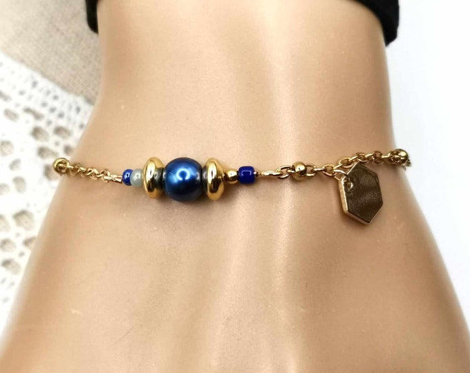 Thin stainless steel bracelet, gold, blue beads