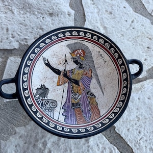 Kylix, handmade and free hand painted, decorated with designs from the Archaic period