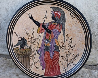 Handmade and free hand painted plate decorated in Archaic style