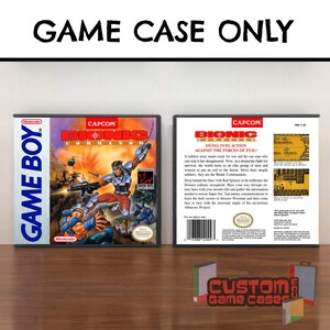 May include: A plastic video game case for the Nintendo Game Boy title Bionic Commando. The front cover features a colorful action illustration of a soldier, while the back cover displays game information, a barcode, and two small gameplay screenshots.