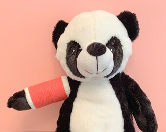 teddy bear with cast on arm