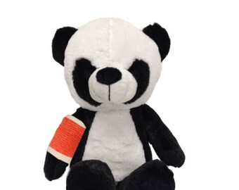 teddy bear with cast on arm