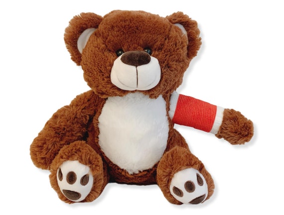 teddy bear with broken arm