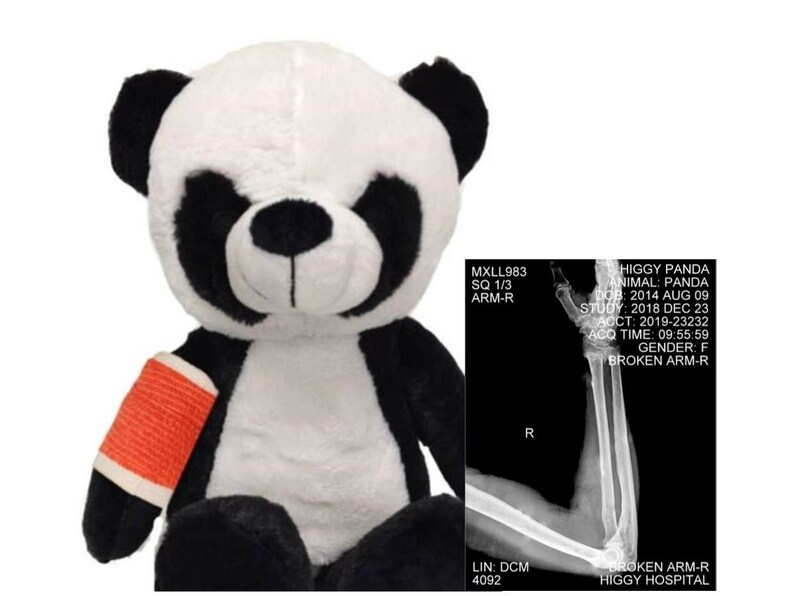 teddy bear with broken arm