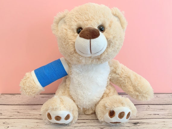 teddy bear with cast on arm