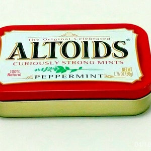 May include: A red and gold tin of Altoids Curiously Strong Mints with the text "The Original Celebrated" and "Peppermint" on the front. The tin is 1.76 ounces (50 grams).
