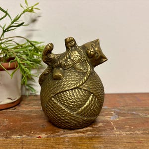 Vintage Solid Brass Cat Bank…Kitten. Sculpture. Retro. Old. Yarn. 1970s. Shiny. Patina. Heavy. Sitting. Figurine. Statue. Made in Korea.
