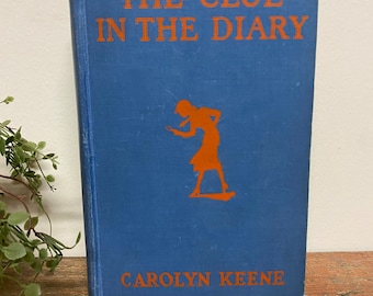 Vintage Nancy Drew Book..,Mystery. Novel. Carolyn Keene. Mildred Benson. Sleuth. Hardcover. Blue. Orange. Silhouette. Illustration. 1930-40s