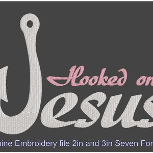 May include: Machine embroidery file design featuring a white fishing hook with the text "Hooked on Jesus" in white and pink lettering. The design is available in seven formats and two sizes: 2 inches and 3 inches.