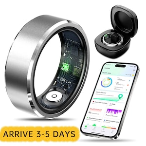 May include: A silver smart ring with an exposed internal circuit board and a glowing green sensor light. The set includes a black charging case containing the ring and a smartphone displaying a health data dashboard with activity tracking metrics.
