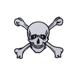 May include: A white skull and crossbones patch. The skull has black eye sockets and a grinning mouth. The crossbones are positioned behind the skull. The patch is embroidered with a detailed design.