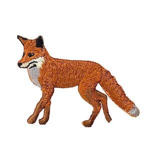 May include: An embroidered patch of a red fox with a white chest and black ears. The fox is walking to the right with its tail curled behind it.