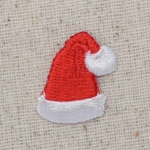 Peut inclure: Applique de chapeau de Père Noël en feutre rouge et blanc pour Noël.
