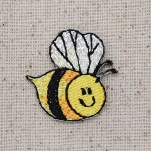 Liten humla - Leende - Flyger till höger - Stryk-på-applikation - Broderad lapp - 156481A