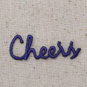 May include: Purple embroidered patch with the word "Cheers" in a cursive font.