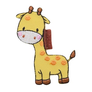 May include: A yellow embroidered giraffe with brown spots and a brown mane. The giraffe has a white face with pink cheeks and a brown patch on its neck.