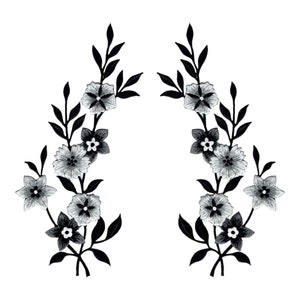May include: Black and white floral embroidery design with two symmetrical branches of leaves and flowers.