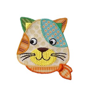 May include: A colorful embroidered cat face patch with a yellow smile, orange and white striped ears, and a blue and white polka dot patch on the head. The cat is wearing a yellow and orange scarf.