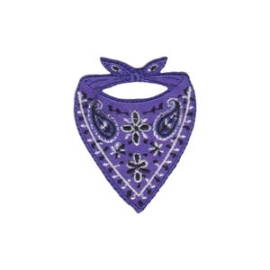 May include: A purple embroidered patch shaped like a folded bandana. The fabric features a classic white and black paisley pattern with intricate floral motifs and a knotted top section, finished with a stitched border around the entire edge.