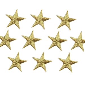 May include: Ten gold star-shaped fabric patches. The stars are about 1 inch in diameter and have a slightly textured surface.