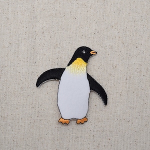 May include: Embroidered penguin patch with black wings, a white body, and a yellow beak and chest.