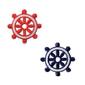May include: Two embroidered iron-on patches in the shape of a ship's wheel. One is red with a white border, the other is navy blue with a white border.