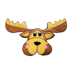 May include: A brown and yellow cartoon moose head with big eyes and a small black nose. The moose has pink cheeks and a friendly expression.
