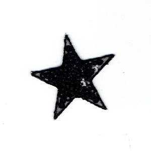 May include: A black star-shaped sequin patch. The star is made of black sequins and has a shiny finish.