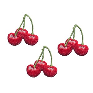 May include: Three sets of embroidered red cherries with green stems. Each set has two cherries.
