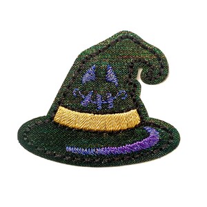 May include: A green witch hat with a purple and blue embroidered design. The hat has a gold band around the brim.