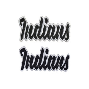 May include: Two black and white embroidered patches with the word "Indians" in a stylized font.