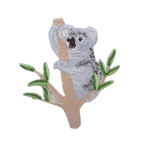 May include: Embroidered iron-on patch featuring a gray koala bear sitting in a tree with green leaves.