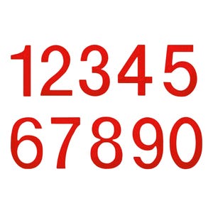 May include: A set of three ceramic mugs with a speckled, matte finish in cream, light grey, and dark grey. Each mug has a simple, minimalist design, suitable for coffee or tea.