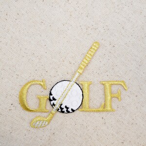 May include: Gold embroidered patch with the word "GOLF" and a white golf ball with a black outline and a gold golf club.