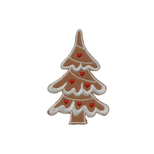 May include: A brown embroidered Christmas tree patch with white frosting-like trim and small red heart accents. The tree is a festive holiday decoration, perfect for adding to clothing or accessories.