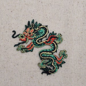 May include: Green, red, and gold embroidered dragon patch. The dragon is curled in a serpentine shape with its head turned to the side.