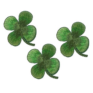 Peut inclure: Trois patchs brodés de trèfles à quatre feuilles de couleur verte.