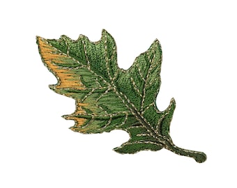 May include: A green and gold embroidered leaf with a detailed vein pattern.