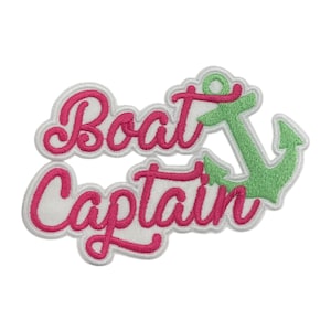 May include: Pink and green embroidered patch with the text "Boat Captain" and an anchor.