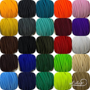 Könnte beinhalten: Eine Sammlung von 25 Spulen mit farbigem Gummiband. Die Bänder sind in einem Raster angeordnet und alle gleich groß. Die Farben umfassen Orange, Türkis, Gelb, Grau, Hellblau, Rotbraun, Lila, Braun, Schwarz, Grün, Rot, Weiß, Beige, Blau, Marineblau, Dunkelgrün, Limettengrün und Braun.