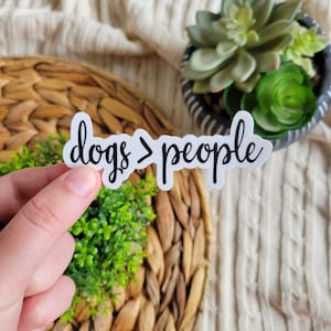Dogs &gt; People Sticker: Funny Waterproof Laptop Decal